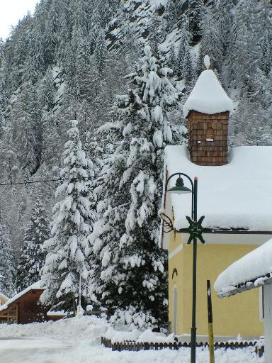 Haus Ranacher mit Skigebiet im Hintergrund
